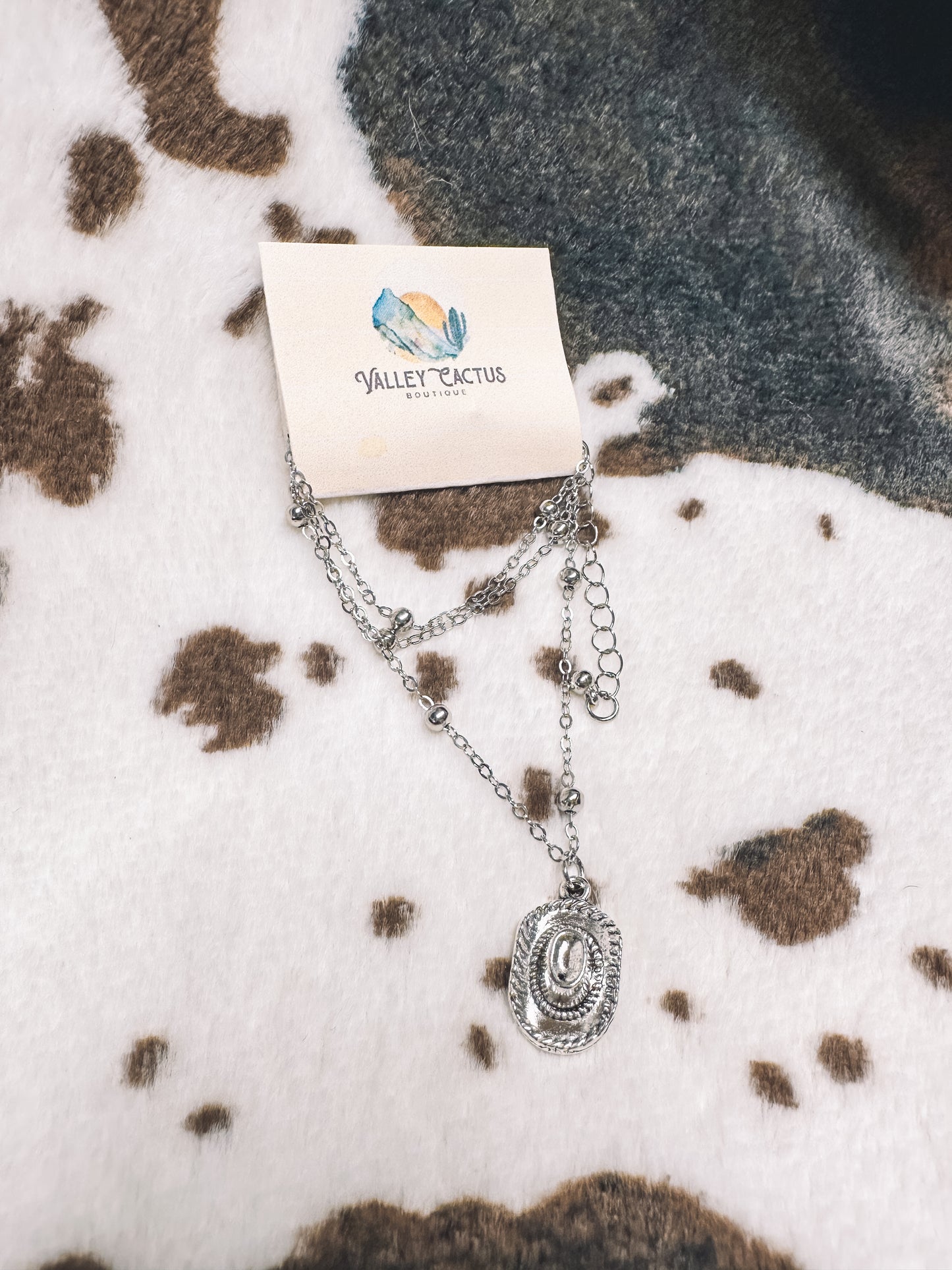 Cowboy hat, western jewelry